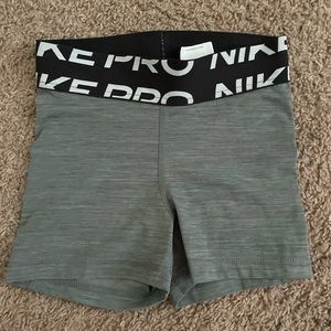 grey nike pros size xs